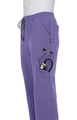 A pair of purple jogger pants featuring a pocket with a stethoscope. The pants have an elastic waistband and drawstrings.