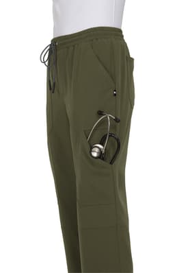 A pair of olive green jogger pants with pockets and a stethoscope tucked into one pocket.