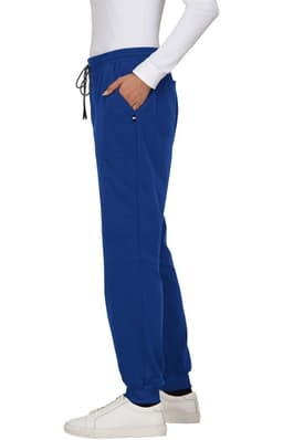 A pair of royal blue jogger pants with an elastic waistband and side pockets, displayed on a model.
