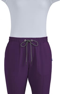 A pair of purple jogger pants with a drawstring waistband, featuring two front pockets and a branding logo.