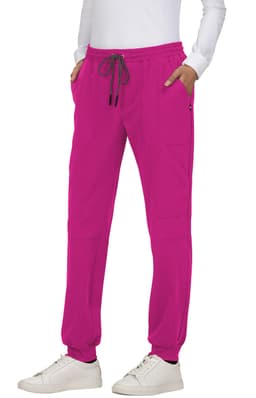 A pair of vibrant pink jogger pants with side pockets and a drawstring waistband, featuring a contrasting trim.