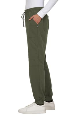 A pair of olive green jogger pants with pockets and a drawstring waistband, worn with a white long-sleeve top.
