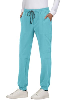 A pair of turquoise jogger pants with pockets and a drawstring waist, featuring a logo.