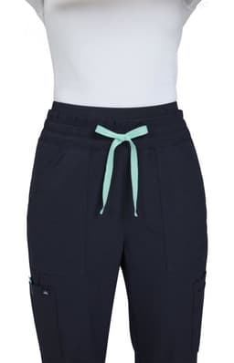 A pair of navy wide-leg pants with a mint green drawstring and side pockets, featuring a branding logo.