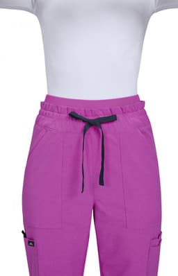 Freda Wide Leg Pant in vibrant pink with an elastic waistband and black drawstring, featuring pockets.