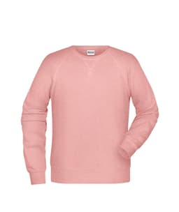 A pink men's sweater with raglan sleeves and a simple design. It features a logo on the label.