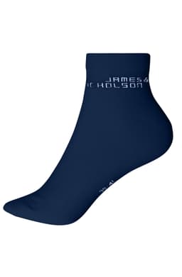 A pair of navy blue organic sneaker socks with a logo on the side.