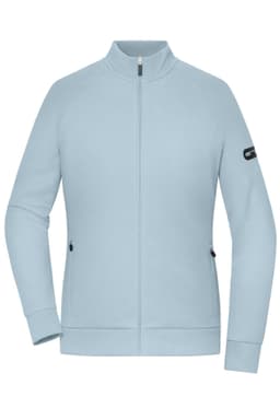 A light blue zip jacket with a high collar and zippered pockets, featuring a branding logo on the sleeve.
