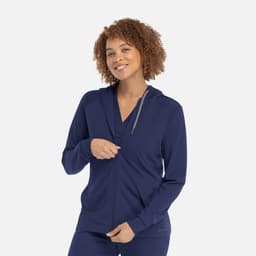 A women's hooded zip-front jacket in navy blue, featuring a modern design and a subtle logo.