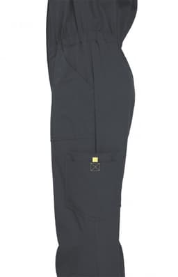 A grey jumpsuit featuring a side view, with an elastic waistband and a pocket. The product has a branding logo.