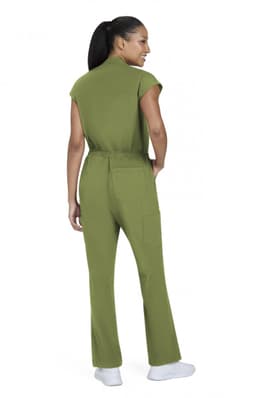 A jumpsuit in olive green, featuring a fitted waist and cap sleeves, shown from the back. It has a logo on the garment.