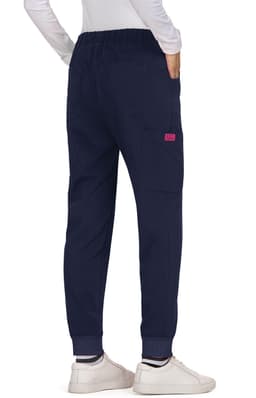 Navy pants with an elastic waistband and pockets, featuring a small coloured logo. Casual silhouette with tapered legs.