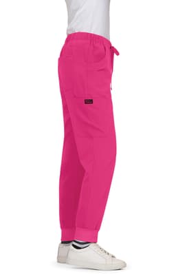A pair of pink cargo pants with a drawstring waist and cuffed ankles, featuring a logo.