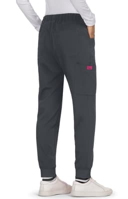 A pair of grey Aster Pants with an elastic waistband and side pockets, featuring a pink logo.