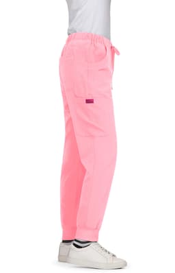 A pair of bright pink Aster Pants with a relaxed fit and elastic cuffs, featuring a logo.