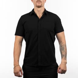 A black short sleeve shirt featuring a button-up design and a small pocket, with a brand logo on the sleeve.