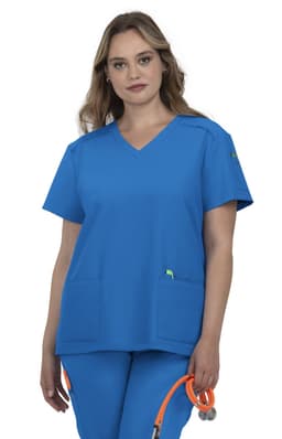 A blue medical scrub top with a V-neck design, featuring two pockets and a logo. The model is holding a stethoscope.