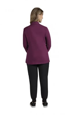 A women's jacket in a rich purple colour, featuring a mock neck and a fitted silhouette, with a rear view displayed.