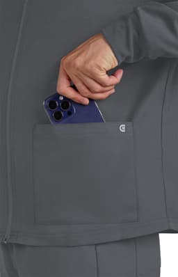 A grey men's jacket featuring a side pocket, with a hand placing a smartphone into the pocket.