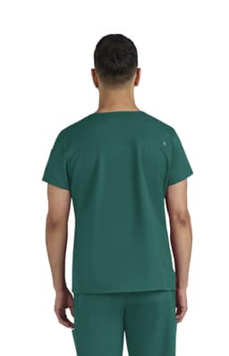 A scrub top in a teal colour, featuring a simple design and a logo on the back.