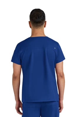 A blue medical scrub top with a straight neckline and short sleeves, featuring a logo on the back.
