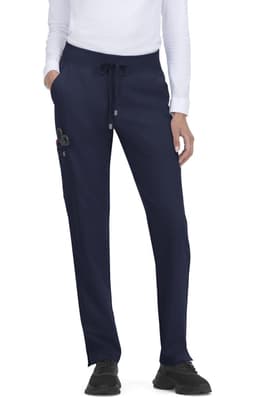 Atria Pant in navy, featuring a drawstring waist and side pockets. Comes with a small logo on the hip.