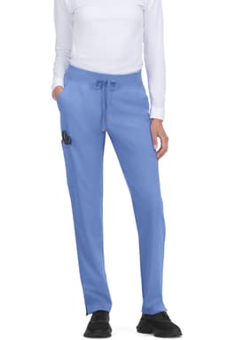 Atria Pant in light blue, featuring a drawstring waist and two side pockets. The model is wearing a white top.