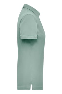 A light green women's polo shirt with a classic collar and short sleeves, featuring a logo.