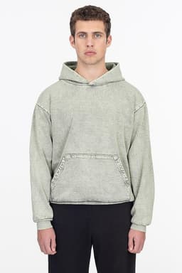 A heavy fleece hooded pullover in a mineral wash finish, featuring a front pocket and a logo. The colour is muted green.