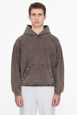 A heavy fleece hooded pullover in a mineral wash brown colour, featuring a front pocket and a loose fit.