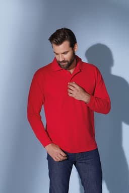 A red long-sleeve polo shirt displayed on a model against a light blue background, featuring a logo.