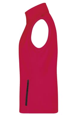 A red ladies softshell vest featuring a high collar and a side zip pocket, with a logo displayed.
