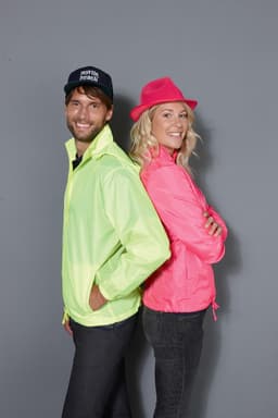 A vibrant pink ladies' rain jacket and a bright yellow men's rain jacket, both with casual styling and logos.