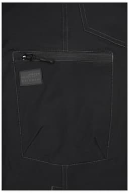 A close-up of black workwear pants featuring a zip pocket and contrasting stitching, with a logo on the pocket.