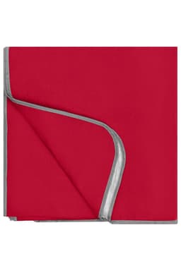 A picnic blanket in vibrant red with a grey edge. It has a soft texture and folded corners.
