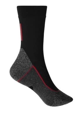 A pair of black and grey work socks with a patterned design and a logo. The socks feature red accents.