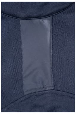 A close-up of a navy blue knitted fleece jacket featuring a smooth, contrasting panel. The jacket has a logo.