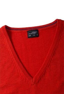 A red v-neck vest made from knitted fabric, featuring a simple design and a tag inside.