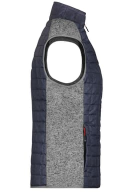 A grey and navy knitted hybrid vest with a sleeveless design and a high collar. Features a logo on the side.