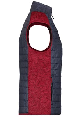 A ladies' hybrid vest featuring a red knitted centre and navy quilted sides, with an open arm design and zipper.