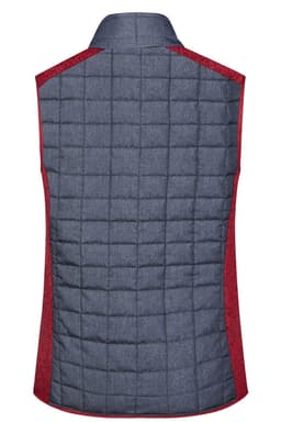 A ladies' knitted hybrid vest in navy with red detailing, featuring a textured, quilted design on the back.
