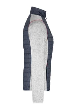 A knitted hybrid jacket in navy and light grey, featuring a zip front and a logo on the chest.