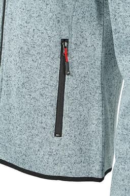 A grey knitted fleece jacket featuring a zippered pocket and a sleek design. It has a logo on the fabric.