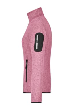 A pink knitted fleece jacket with zippered pockets and a logo on the sleeve. Features a high collar and long sleeves.