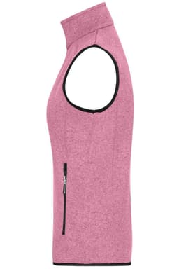 A pink knitted fleece vest with a high collar and a side zip pocket, featuring black trim.