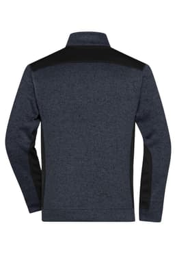 A navy and black men's knitted workwear fleece jacket with a high collar and long sleeves, featuring a logo.