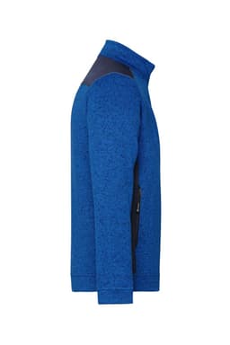 A blue knitted fleece jacket featuring a high collar and a contrasting panel. It has a logo on the sleeve.