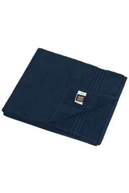 A navy blue sauna sheet folded neatly with a folded edge and a small label visible.
