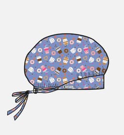 A printed unisex bouffant cap in blue with patterns of drinks and sweets, featuring an adjustable tie.