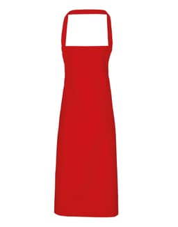 A red bib apron made of 100% organic cotton, featuring a simple design and a logo on the front.